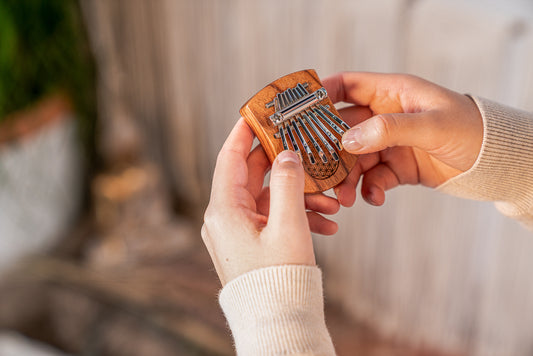Meinl Sonic Energy Solid "Flower of Life" Mini Kalimba - 8 notes, Red Zebrawood detail view 2 at Luna Panther alternate view