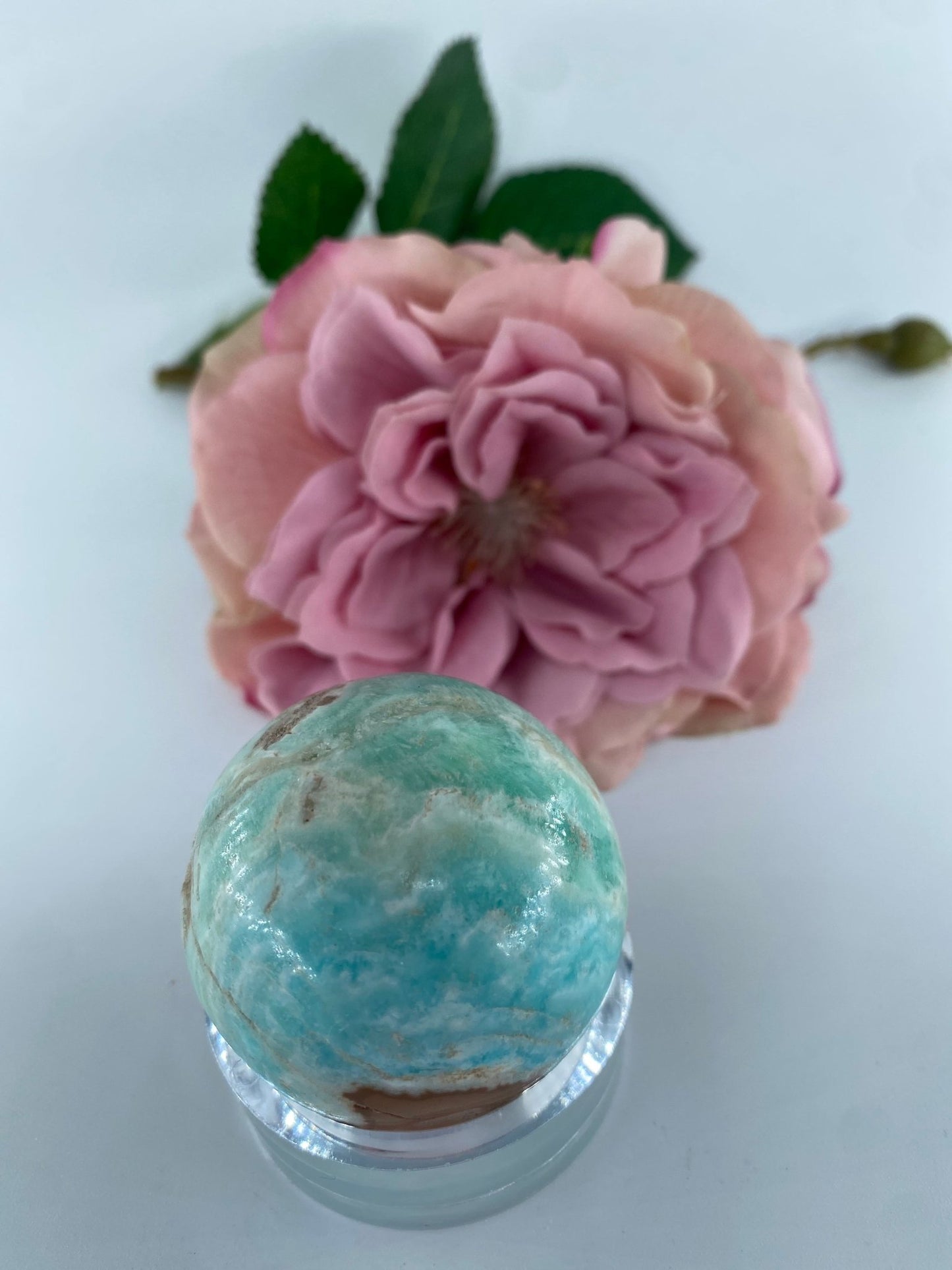 Polished Blue Aragonite Sphere 116 grams featuring pale aqua tone with silky texture - Luna Panther