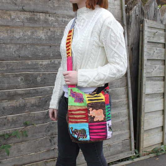 Polished Ethnic Sling Bag - Chocolate / Elephant featuring natural patterning and unique variations - Luna Panther