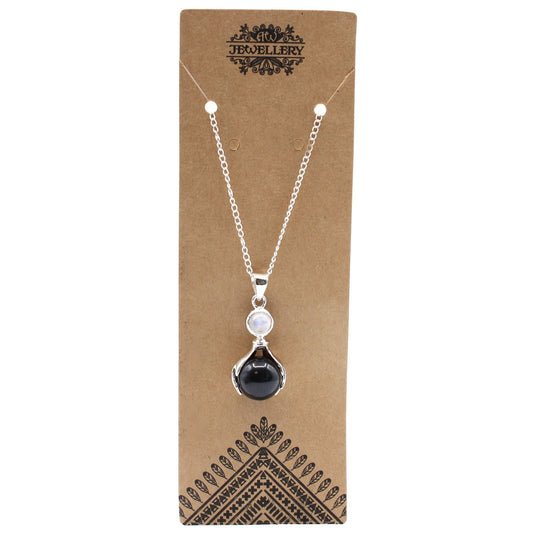 Polished Gemstone Healing Hands Pendant - Black Agate featuring banded patterns and glossy finish - Luna Panther