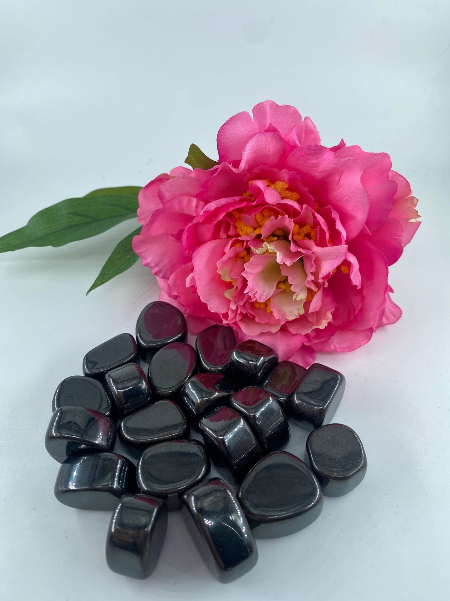 Polished Hematite - Tumble Stone featuring metallic grey sheen and mirror finish - Luna Panther