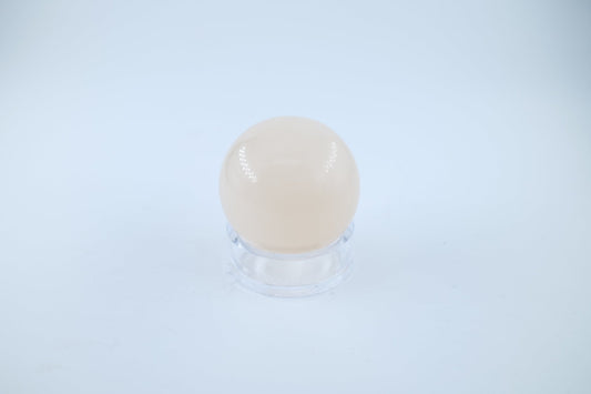 Polished Light Honey Calcite Sphere 170 grams featuring golden honey tone and glassy sheen - Luna Panther