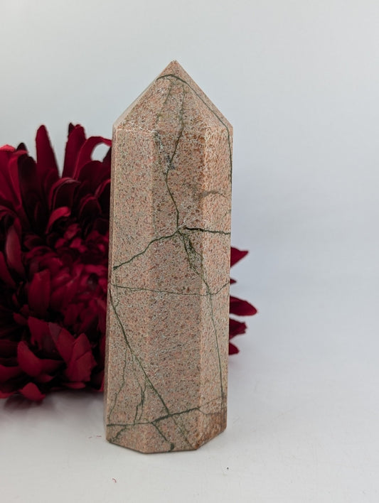 Polished Natural Unakite Point 523g featuring green and pink mottled pattern - Luna Panther