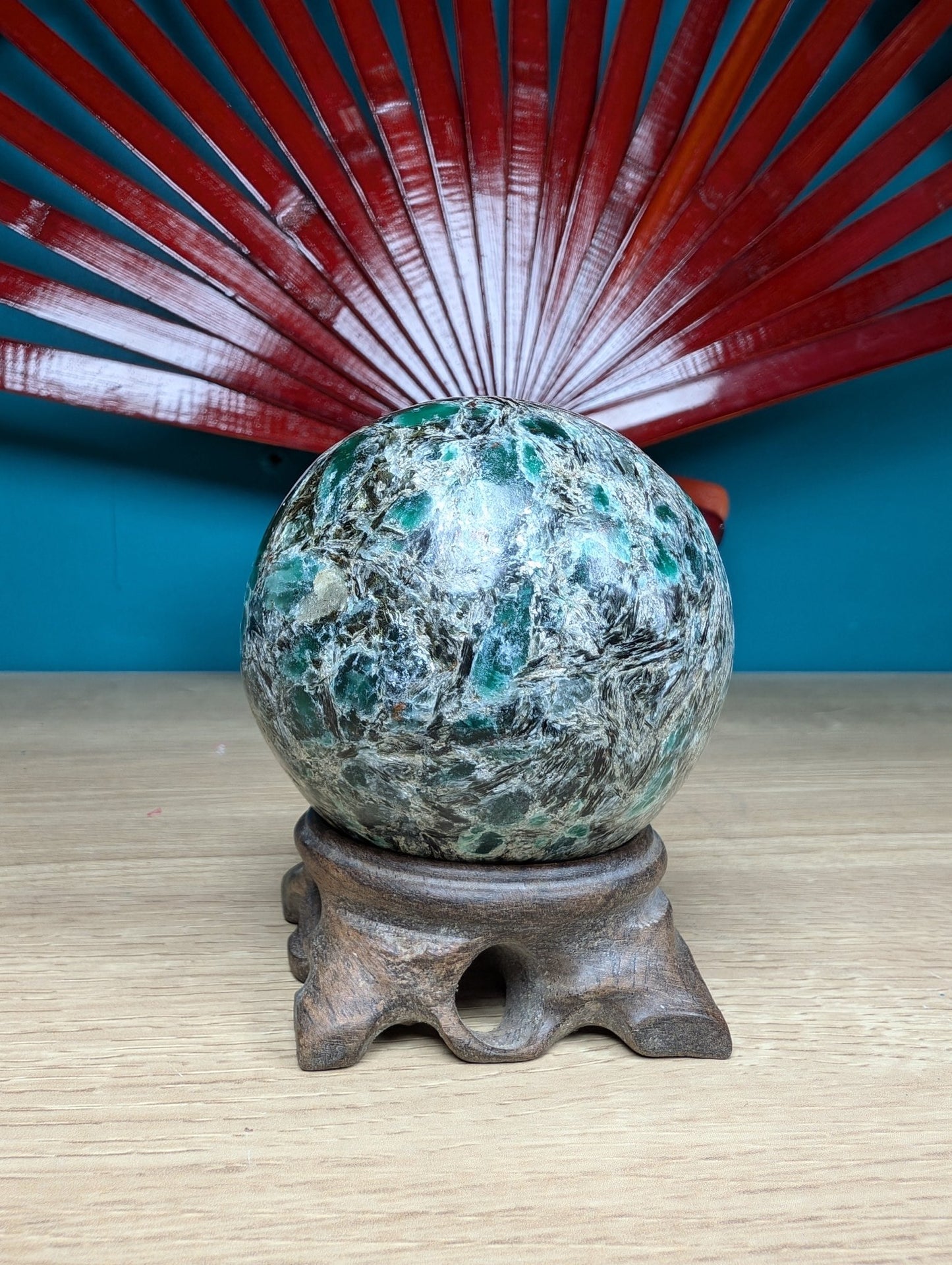 Natural Polished Rare Emerald in Matrix Sphere 450g featuring vibrant green tone and crystalline clarity - Luna Panther