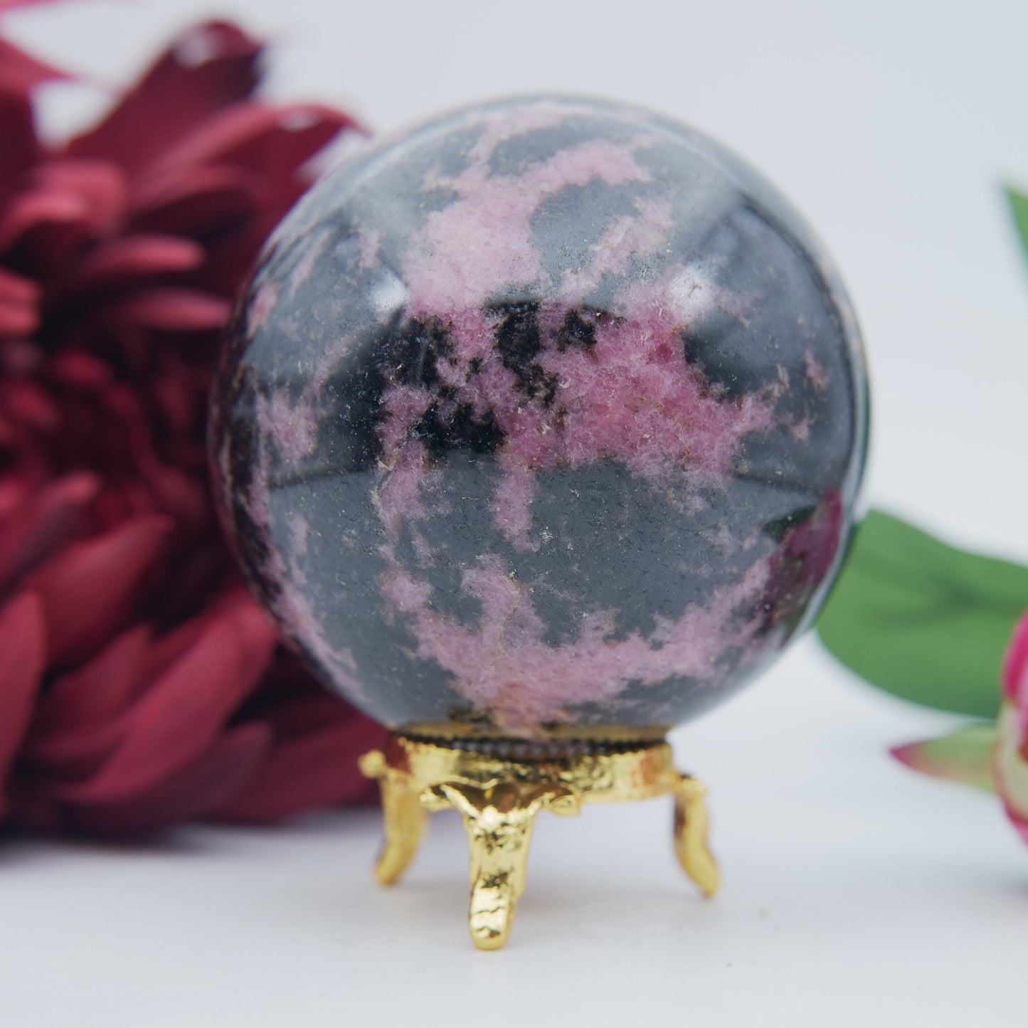 Rhodonite Sphere 689 grams - Luna Panther