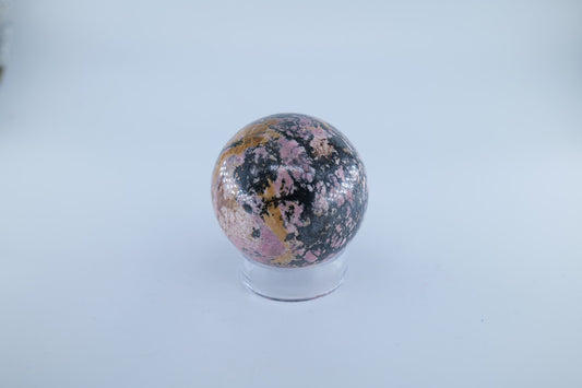 Polished Rhodonite Sphere Pakistan 440 grams featuring pink tone with black veining - Luna Panther