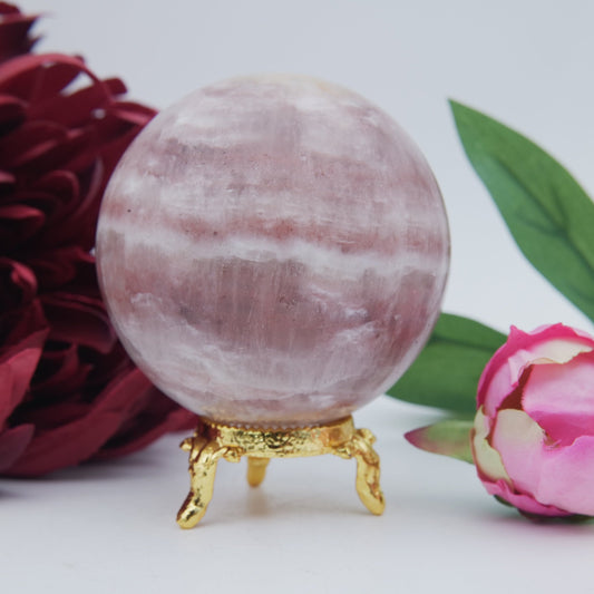 Natural Strawberry Calcite Sphere 526 grams featuring soft translucent tone and gentle sheen - Luna Panther