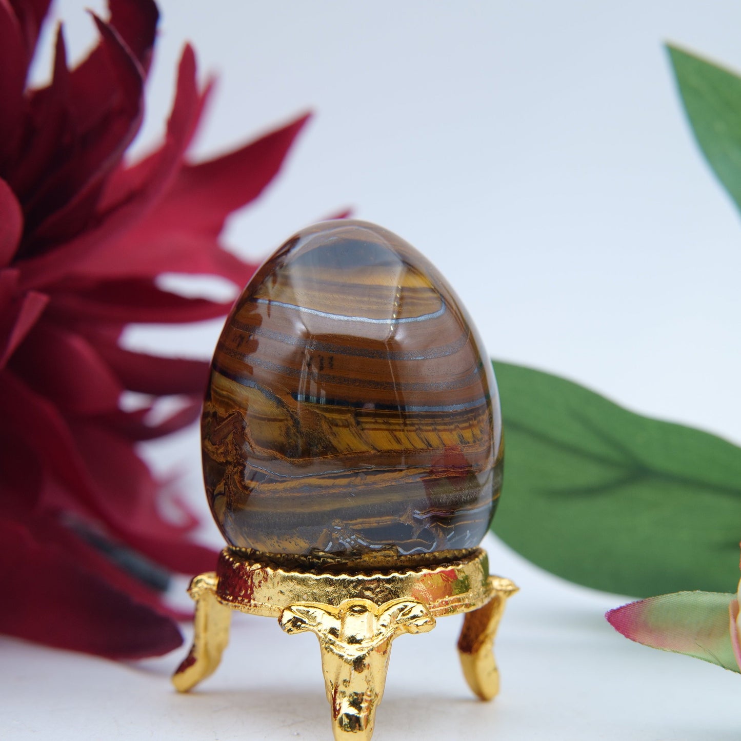 Polished Tigers Eye Crystal Egg 45mm featuring chatoyant golden-brown bands - Luna Panther