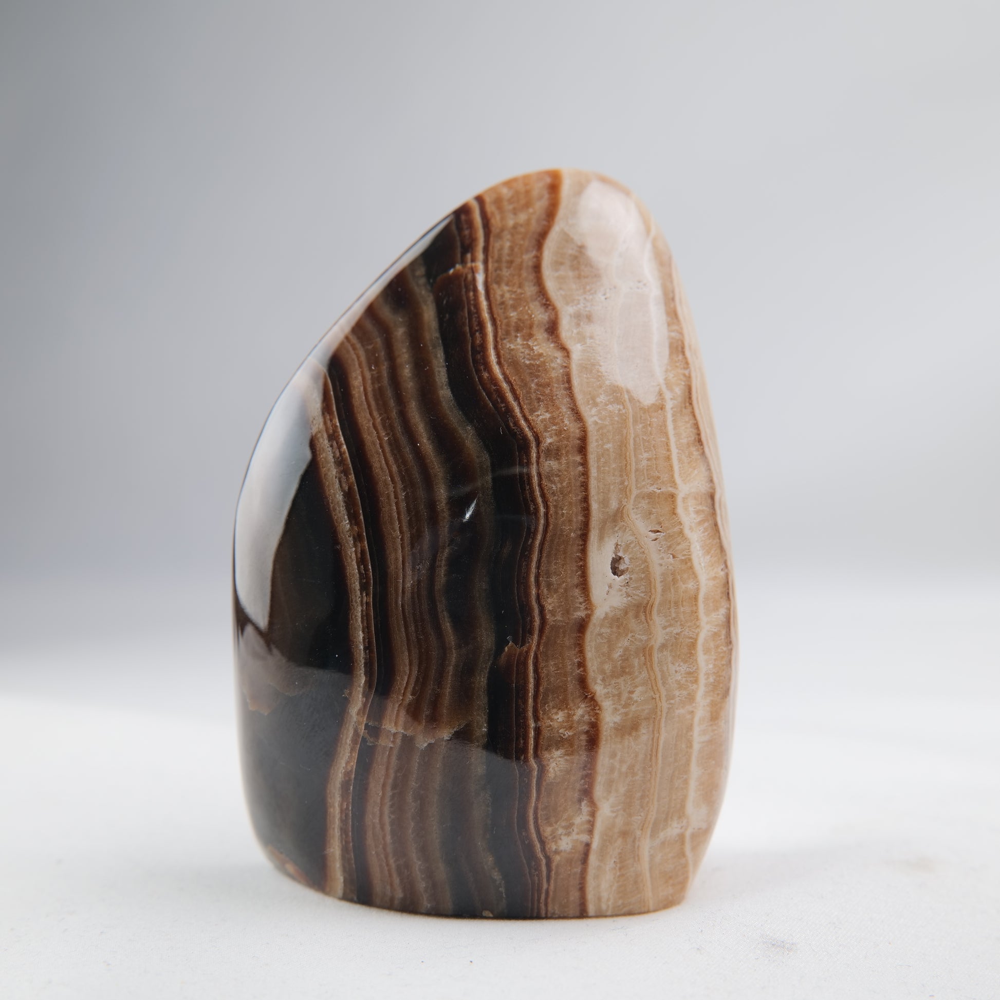 Chocolate Calcite polished freeform 360g main front view