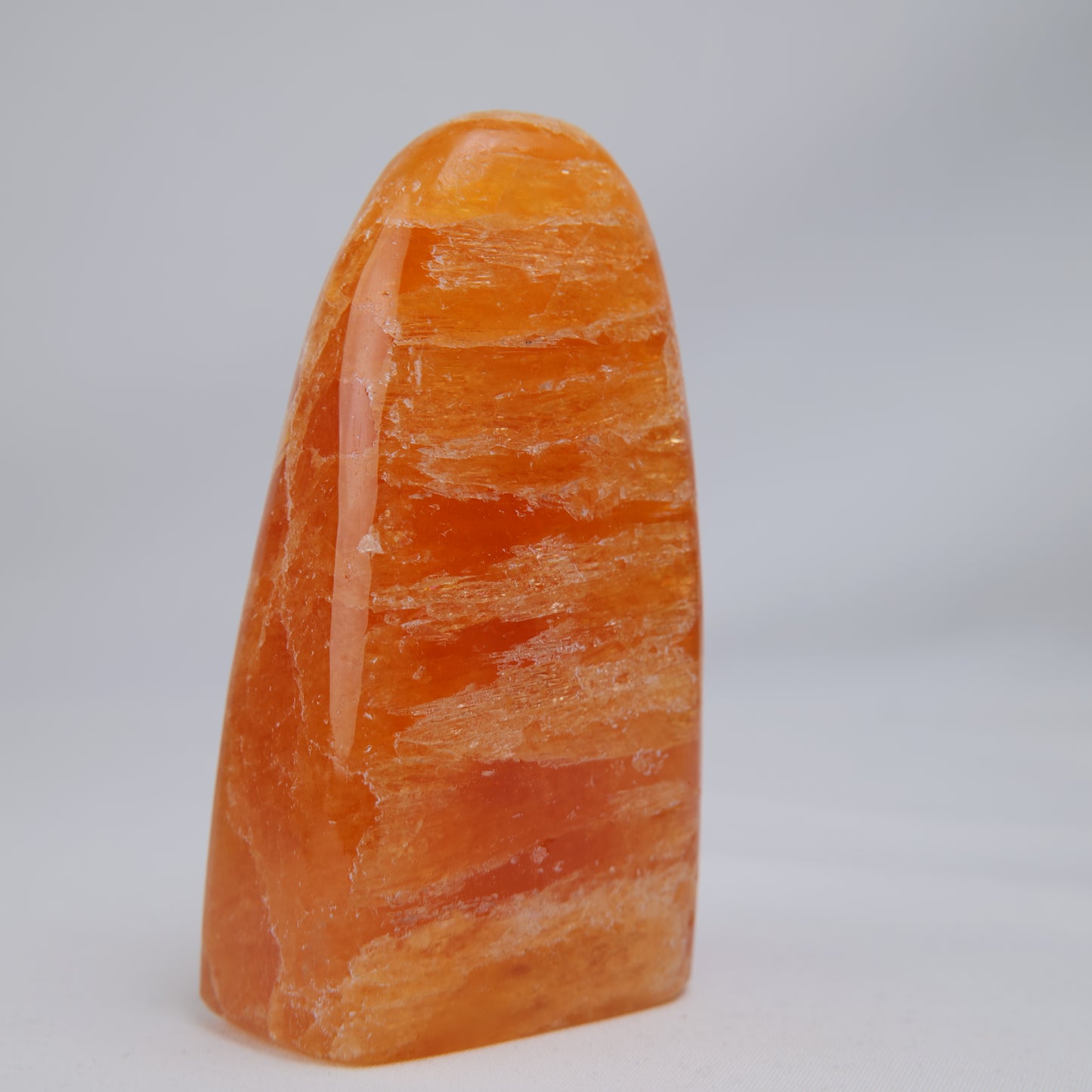 orange calcite freeform 328g reverse side view