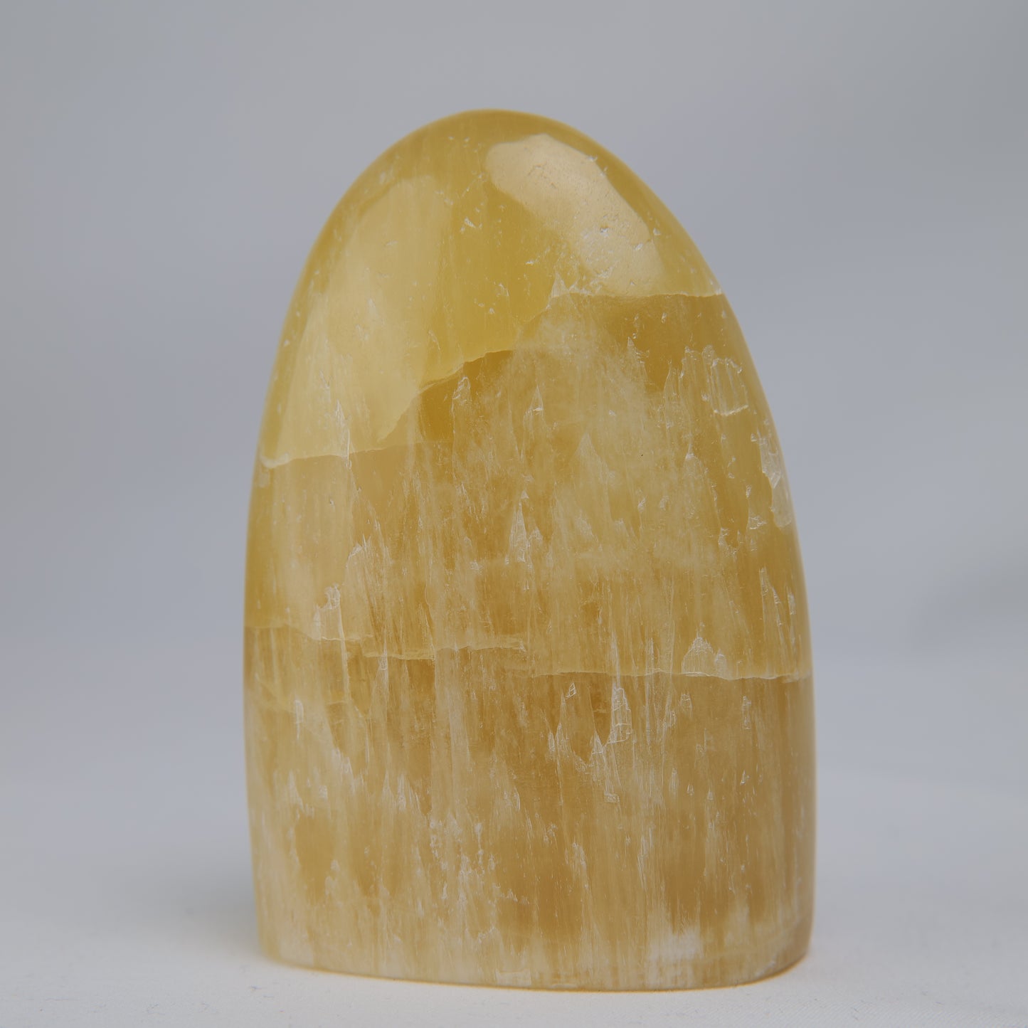 honey calcite freeform 302g side view