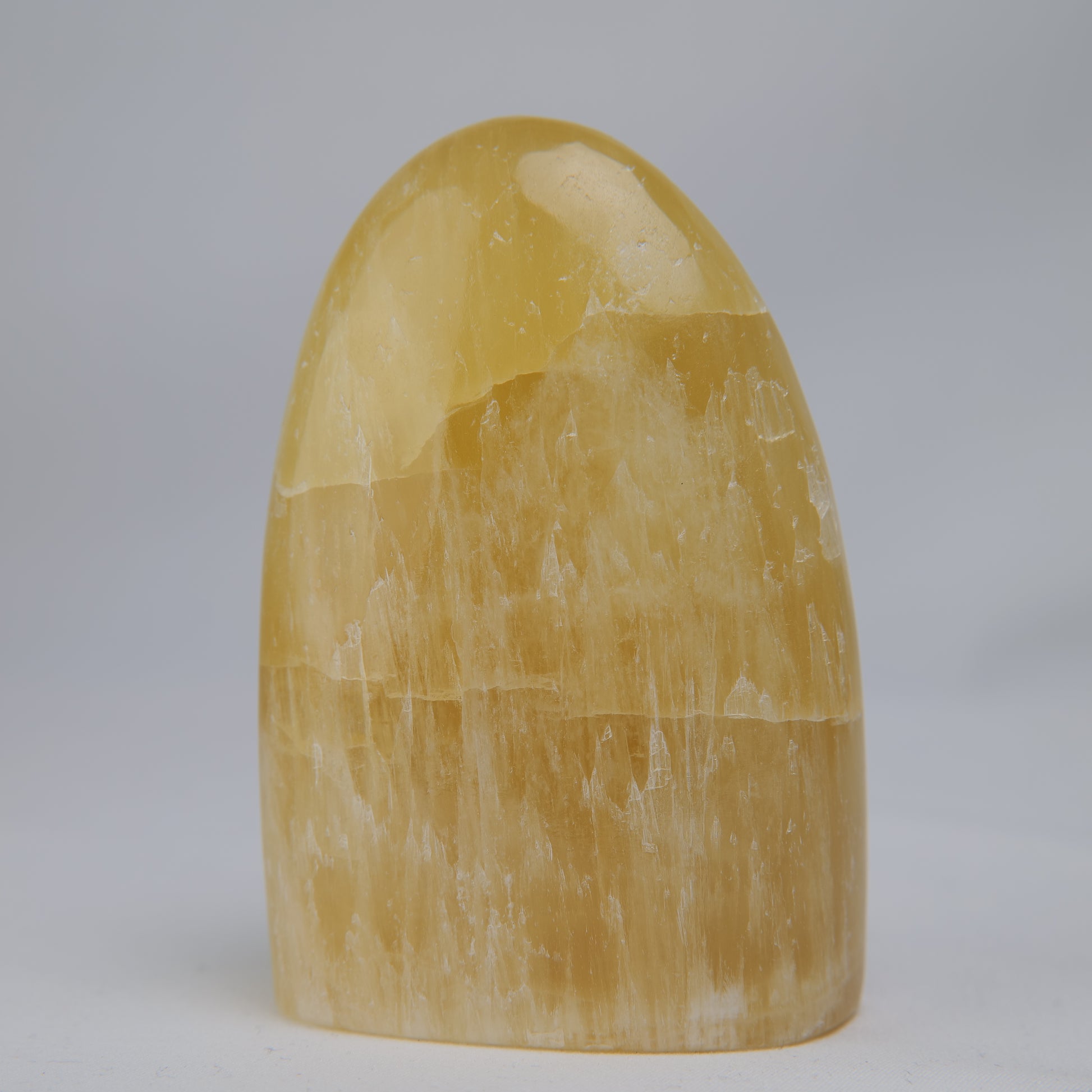 honey calcite freeform 302g side view