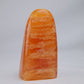 orange calcite freeform 328g back view