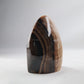 Chocolate Calcite polished freeform 360g angled banded face view