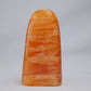 orange calcite freeform 328g side view