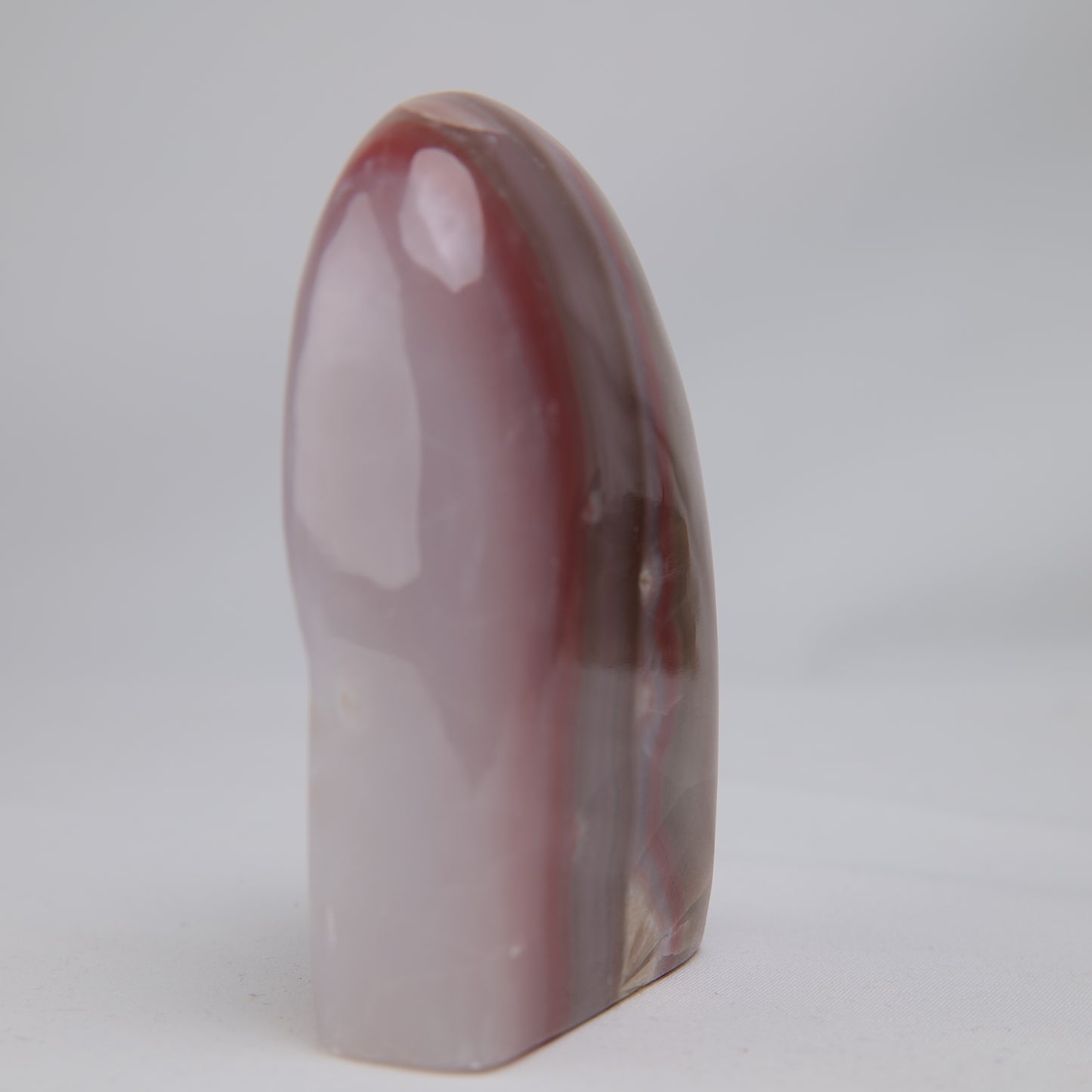 Pink Banded Onyx Freeform, 337g, pink banded onyx freeform 337g side view