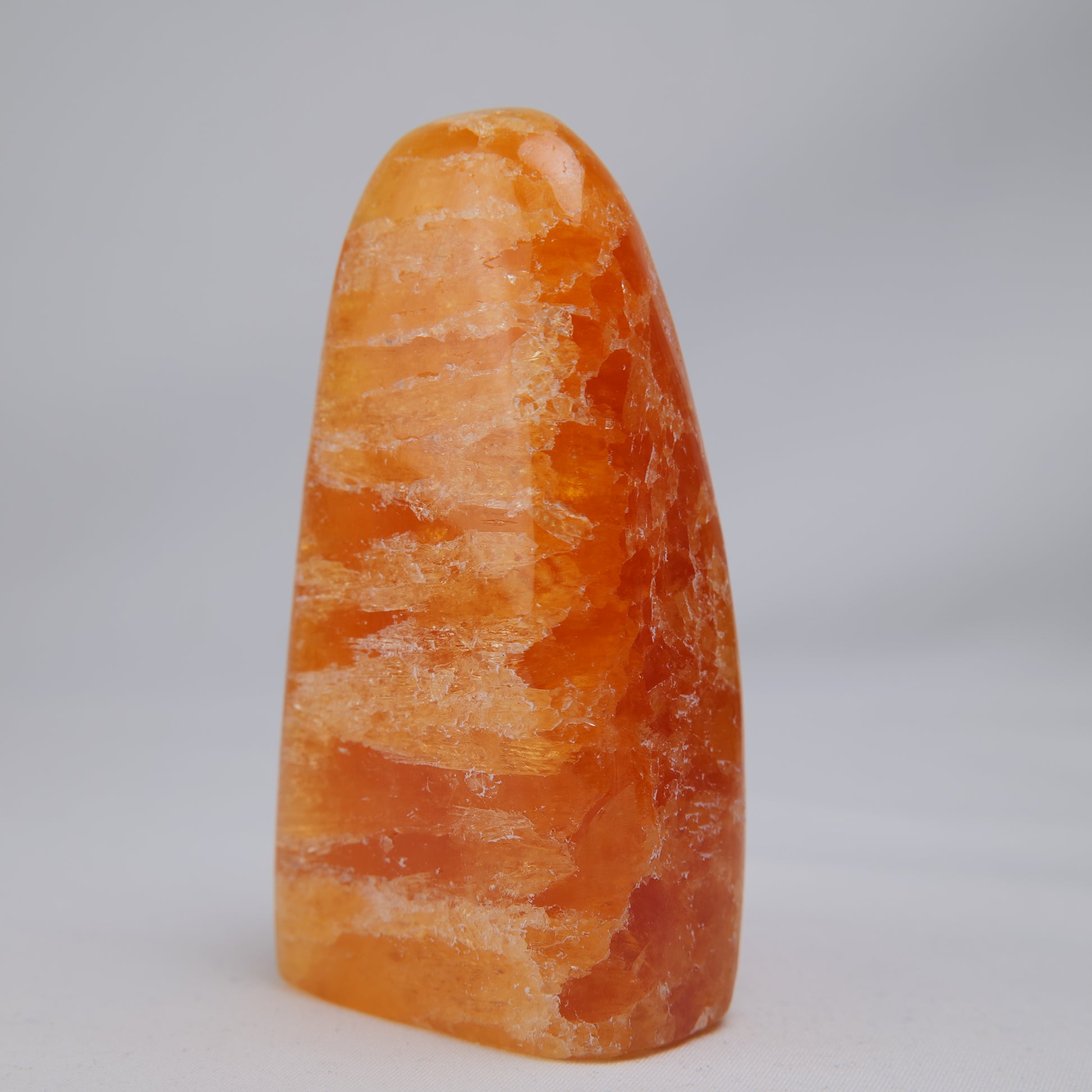 orange calcite freeform 328g orange band detail