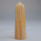 Yellow Banded Calcite Point 65g front