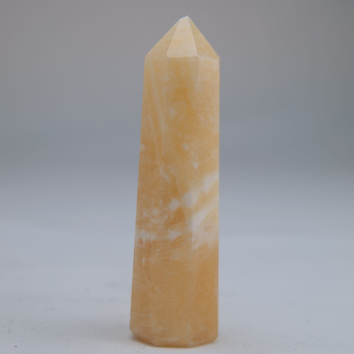 Yellow Banded Calcite Point 51g front