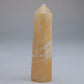 Yellow Banded Calcite Point 51g front
