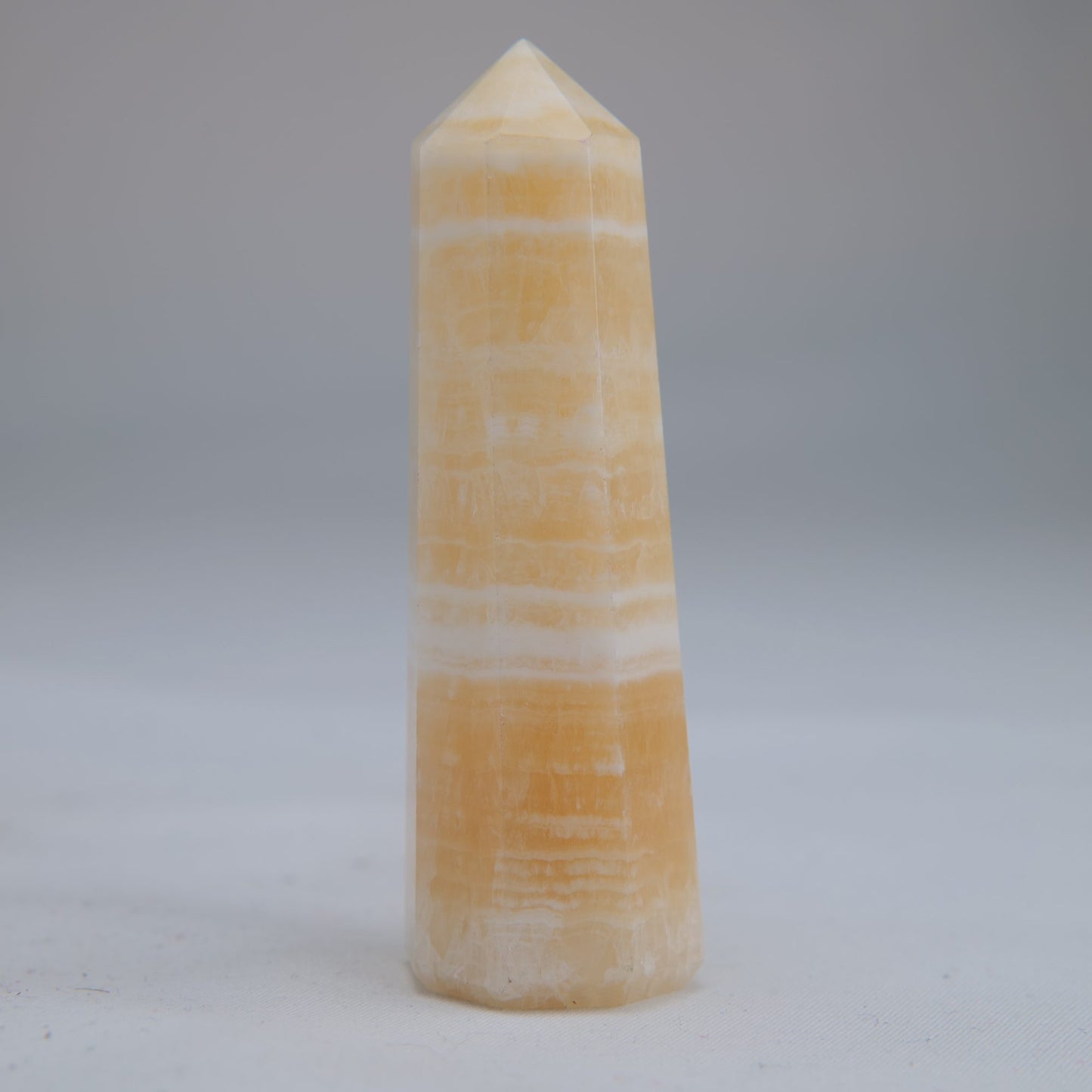 Yellow Banded Calcite Point 64g side