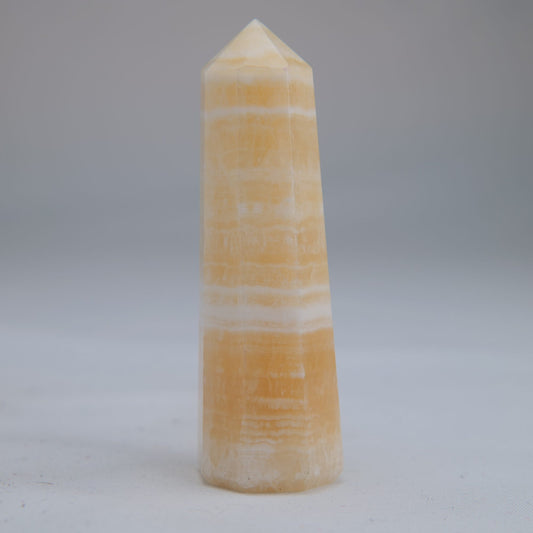 Yellow Banded Calcite Point 64g side alternate view