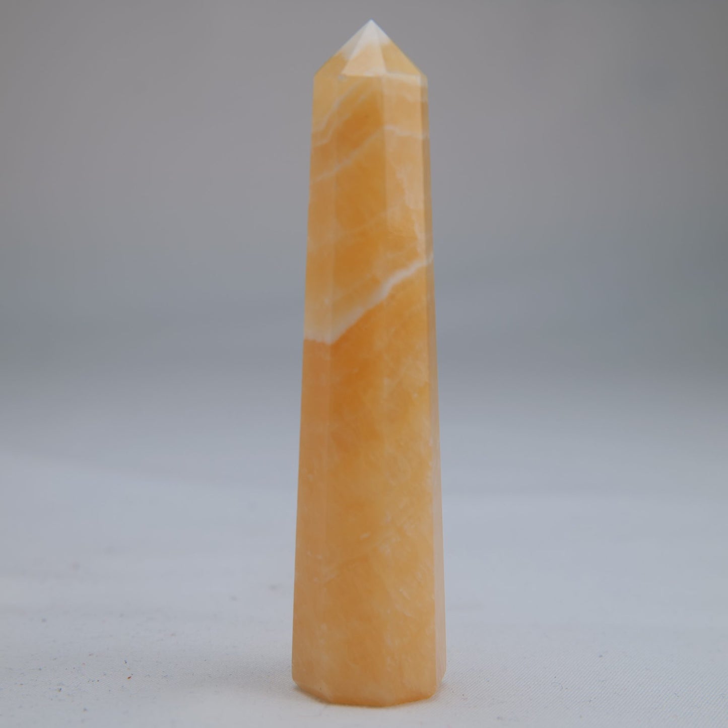 Yellow Banded Calcite Point 57g front