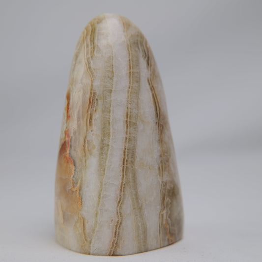 Aragonite Freeform — 318 g (100 mm) — Polished Aragonite freeform with pale cream and warm beige natural layered banding. Product image 2 of 5. alternate view