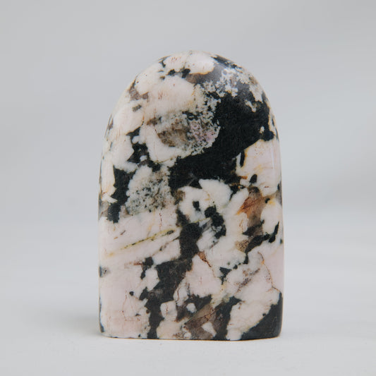 Black Jade with Pink Thulite Freeform — 273 g (80 mm) — one-of-a-kind natural crystal, product image 1 of 1.