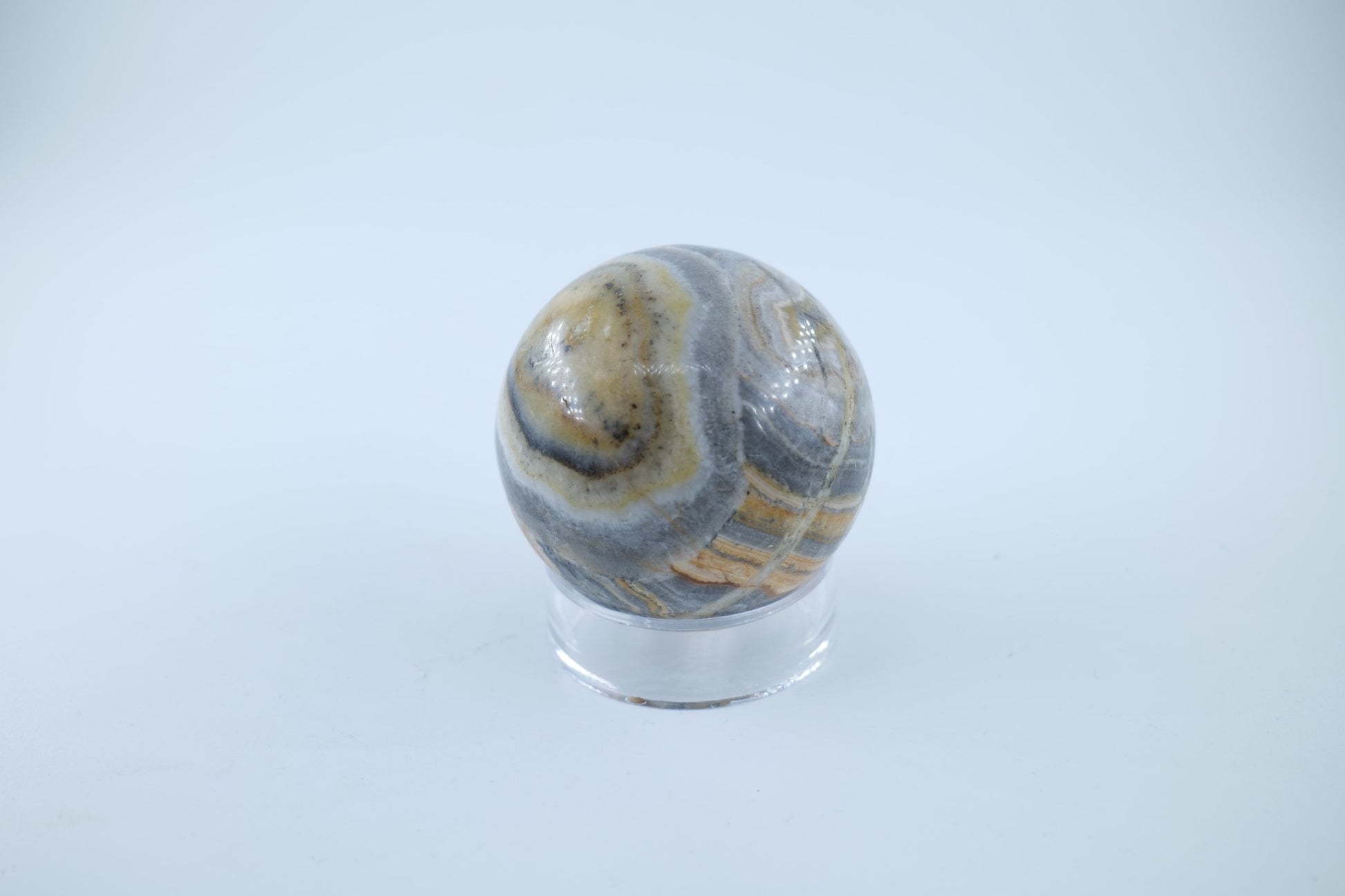 Polished Bumblebee Calcite Sphere 257 grams featuring soft translucent tone and gentle sheen - Luna Panther