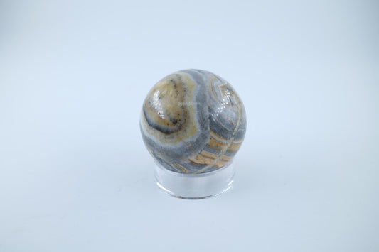 Polished Bumblebee Calcite Sphere 257 grams featuring soft translucent tone and gentle sheen - Luna Panther