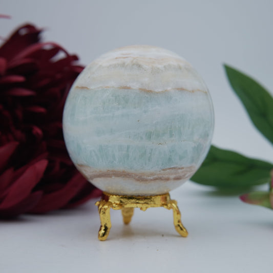 Caribbean Calcite Sphere 502 grams - Luna Panther