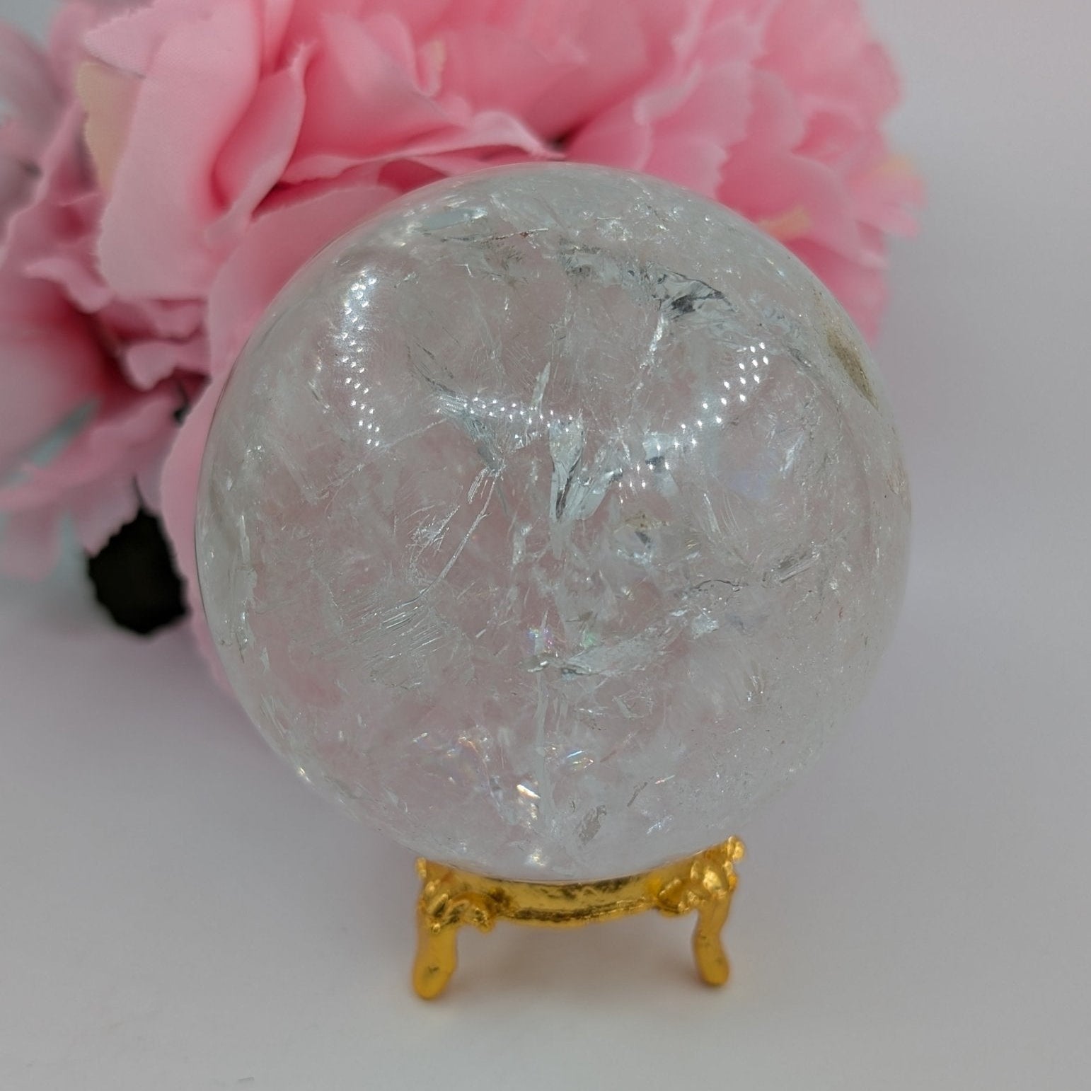 Polished Clear Quartz Sphere - 77mm, 616g featuring clear transparency and light-catching facets - Luna Panther
