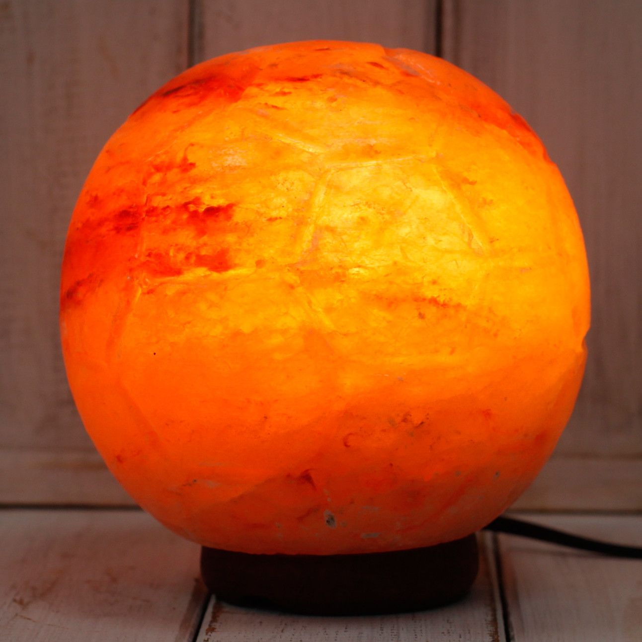 Polished Crafted Salt Lamp Football featuring natural patterning and unique variations - Luna Panther