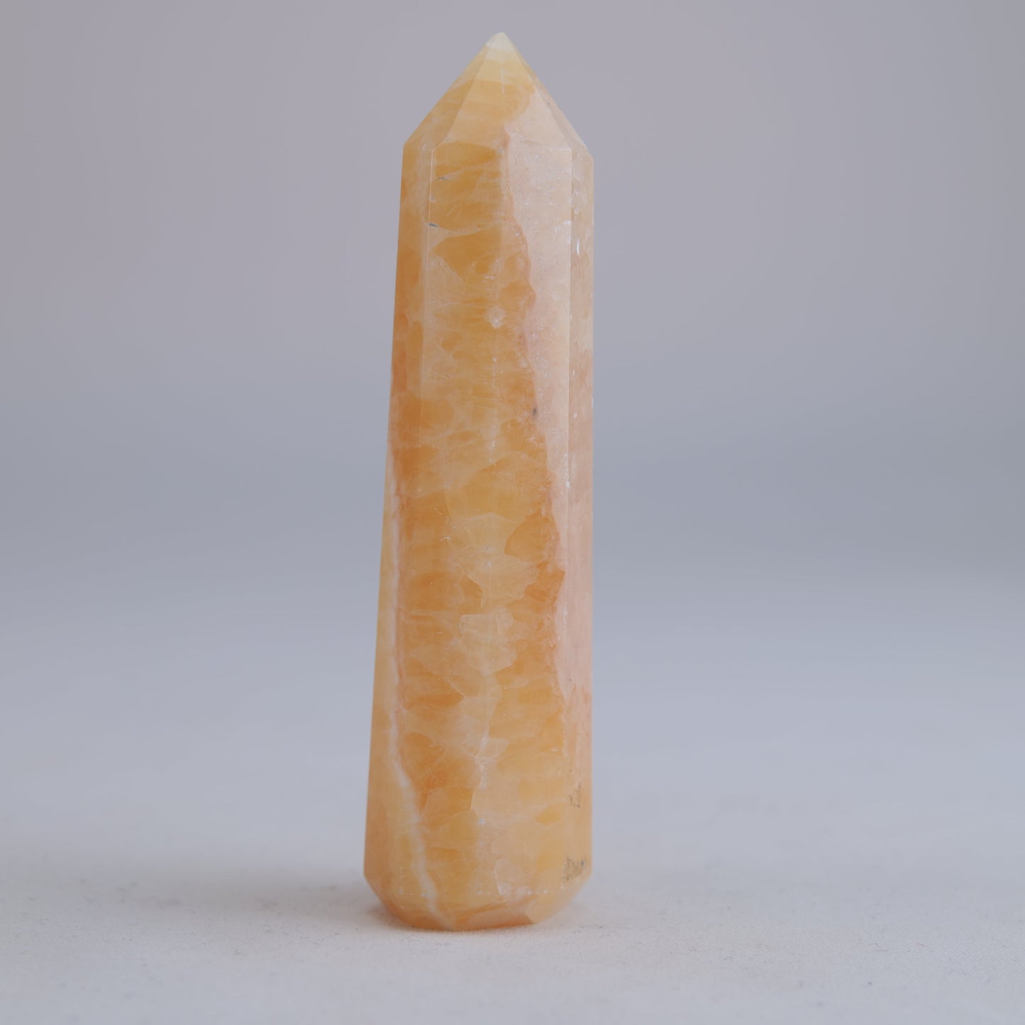 Yellow Banded Mexican Calcite 85g natural crystal tower back