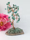Polished Green Aventurine Crystal Tree on Natural Agate 135mm featuring green tone with subtle sparkle - Luna Panther