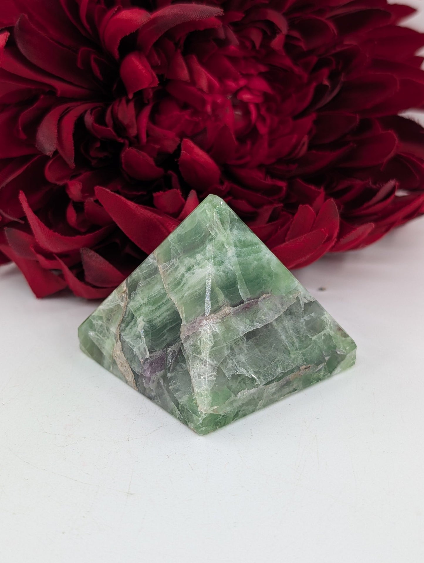 Polished Green Fluorite Pyramid 55Mm featuring banded green‑purple hues and glassy clarity - Luna Panther