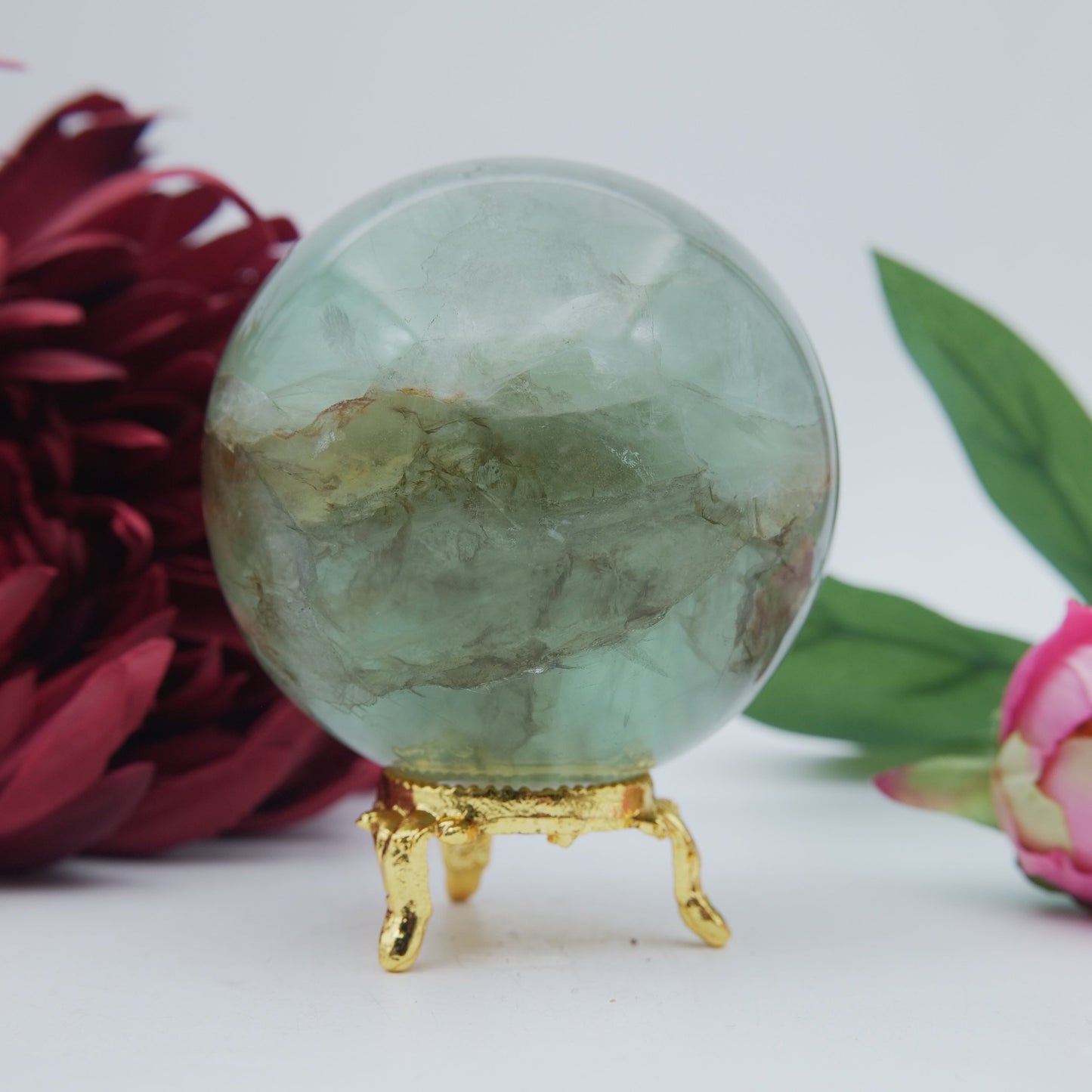 Polished Green Fluorite Sphere 630g 70mm featuring banded green‑purple hues and glassy clarity - Luna Panther