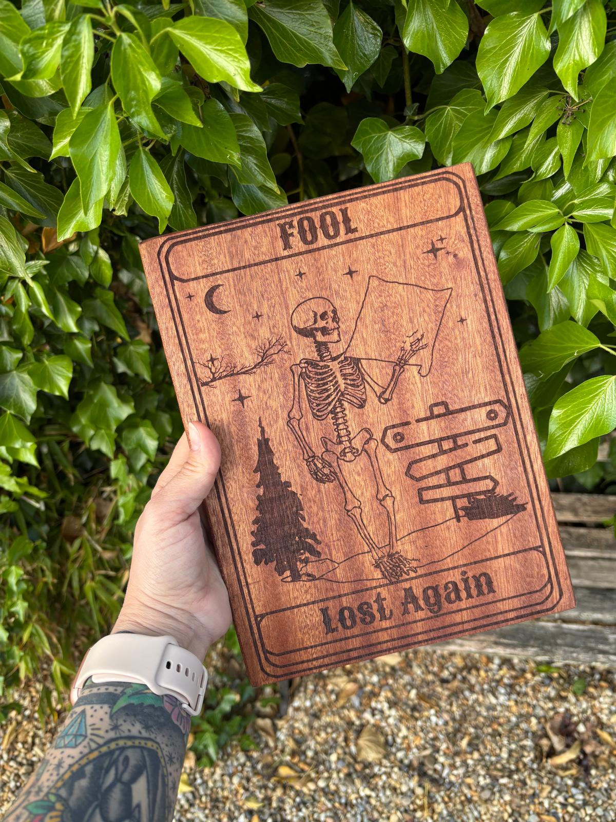 Polished Handcrafted Wooden Tarot Card - Fool/Lost Again featuring natural patterning and unique variations - Luna Panther