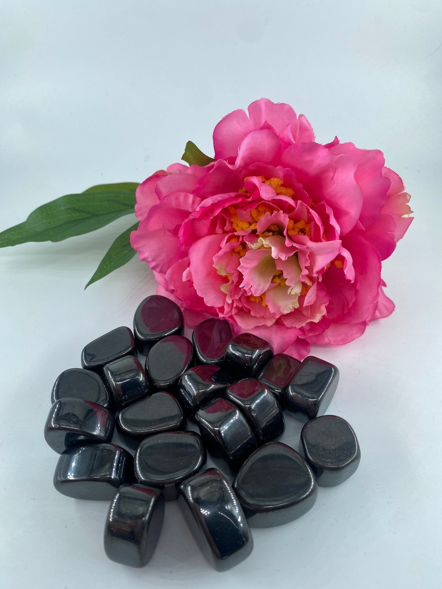 Polished Hematite - Tumble Stone featuring metallic grey sheen and mirror finish - Luna Panther