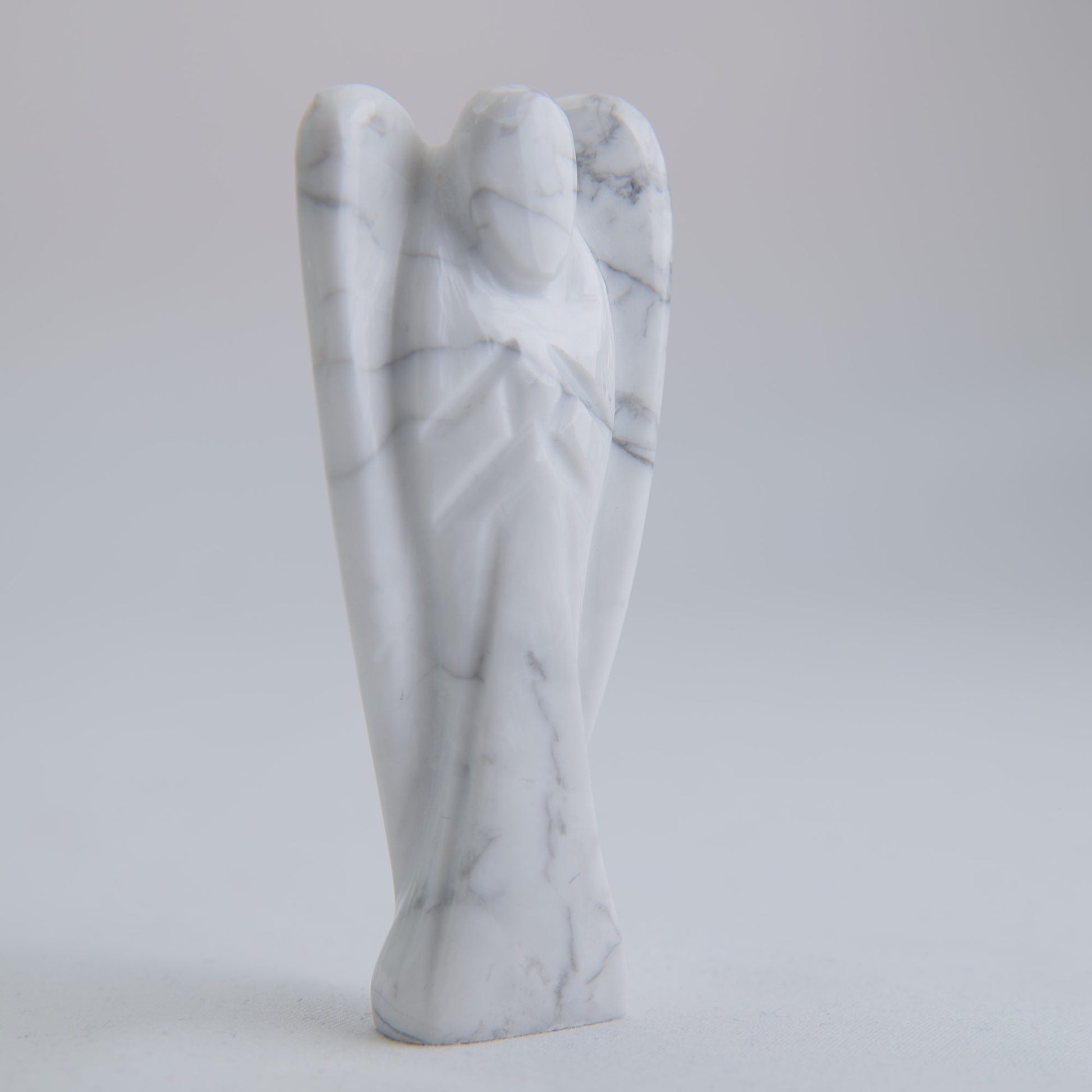 Howlite Angel Carving 58g 75mm - Luna Panther