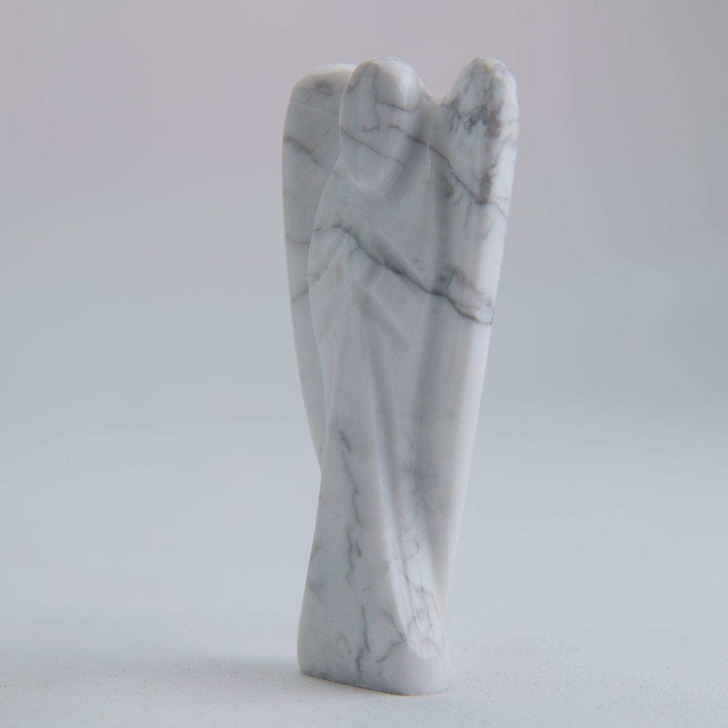 Howlite Angel Carving 58g 75mm - Luna Panther