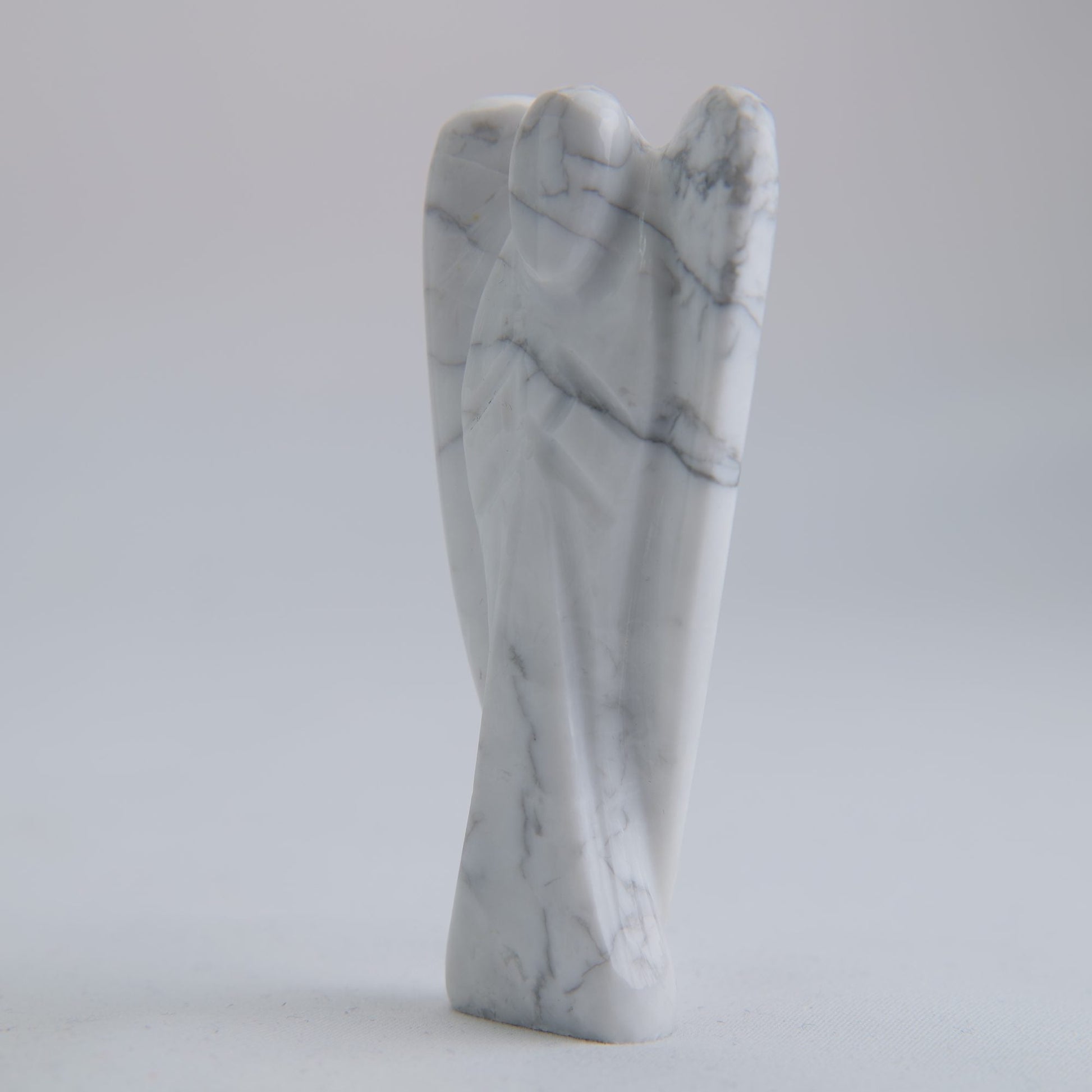 Howlite Angel Carving 58g 75mm - Luna Panther