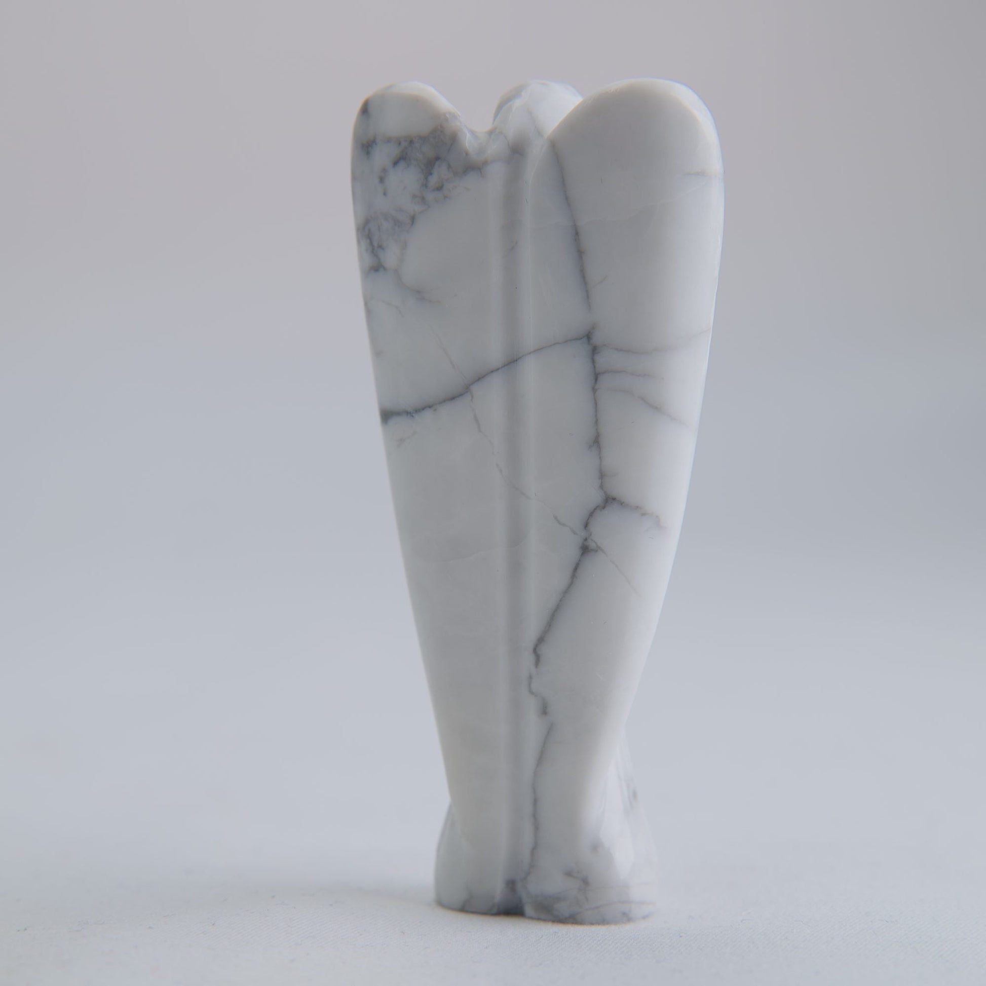 Howlite Angel Carving 58g 75mm - Luna Panther