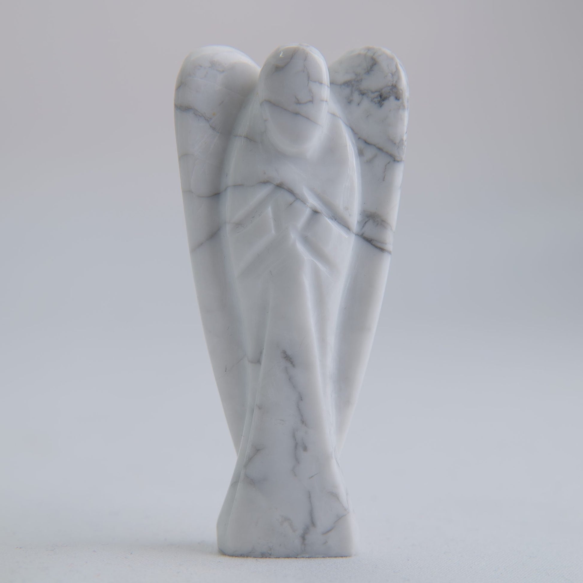 Howlite Angel Carving 58g 75mm - Luna Panther