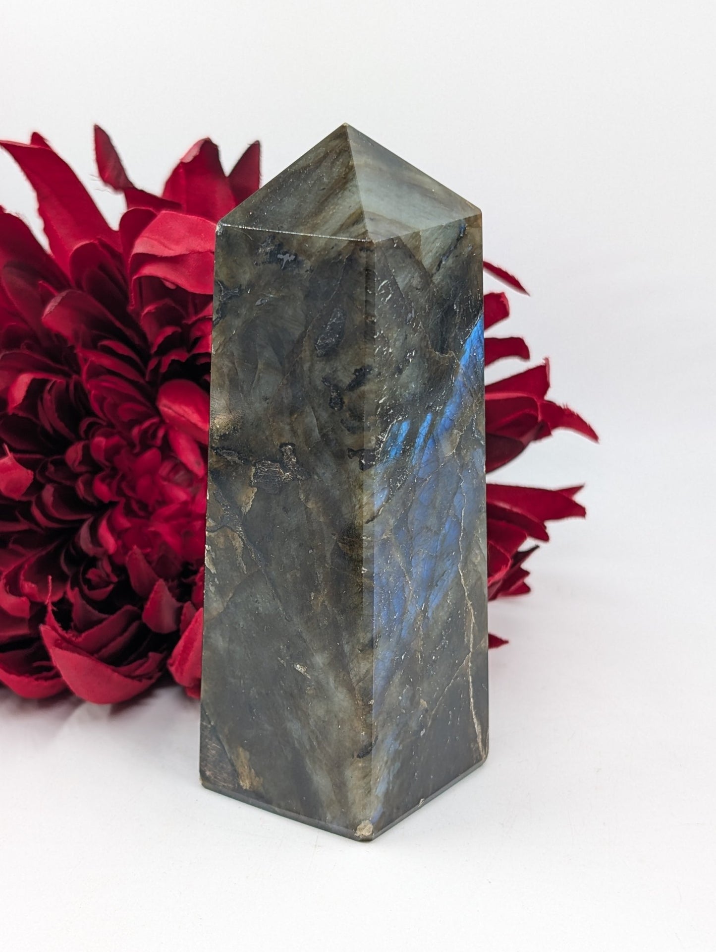 Polished Labradorite Tower 460g featuring blue flash and iridescent shimmer - Luna Panther