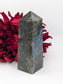 Polished Labradorite Tower 460g featuring blue flash and iridescent shimmer - Luna Panther