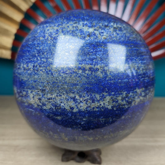 Polished Lapis Lazuli AAA+ Grade Sphere 9750g featuring royal blue tone with gold pyrite flecks - Luna Panther
