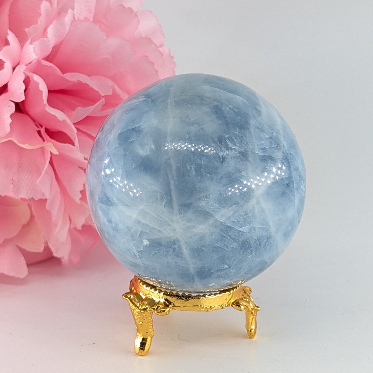 Polished Natural Blue Calcite Sphere (348g, 63mm) from Madagascar featuring soft blue tone and velvety translucence - Luna Panther