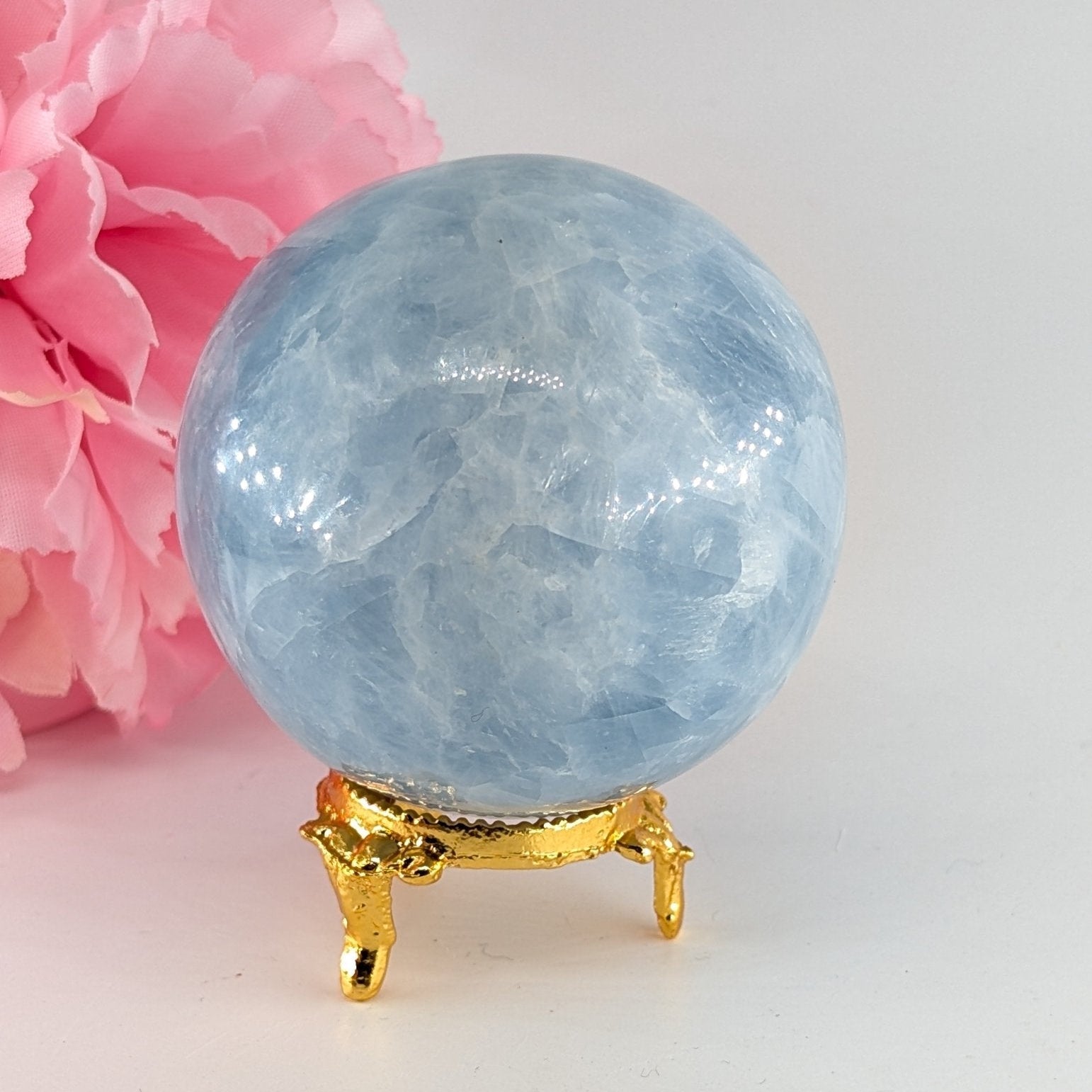 Polished Natural Blue Calcite Sphere (397g, 66mm) from Madagascar featuring soft blue tone and velvety translucence - Luna Panther